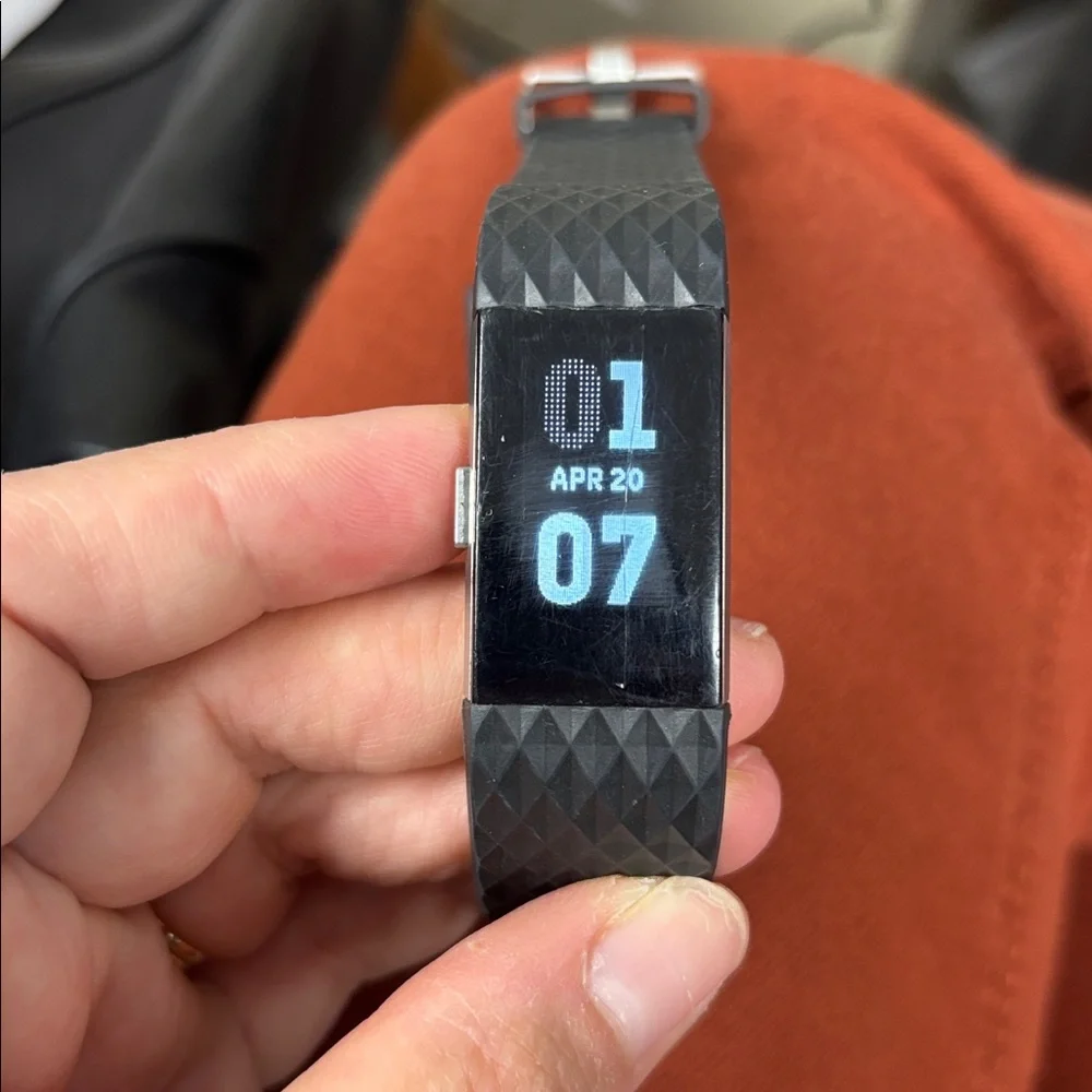 Black Fitbit Charge 2 with Charger